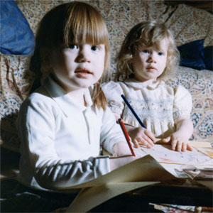 Alice aged 4 drawing with her little sister